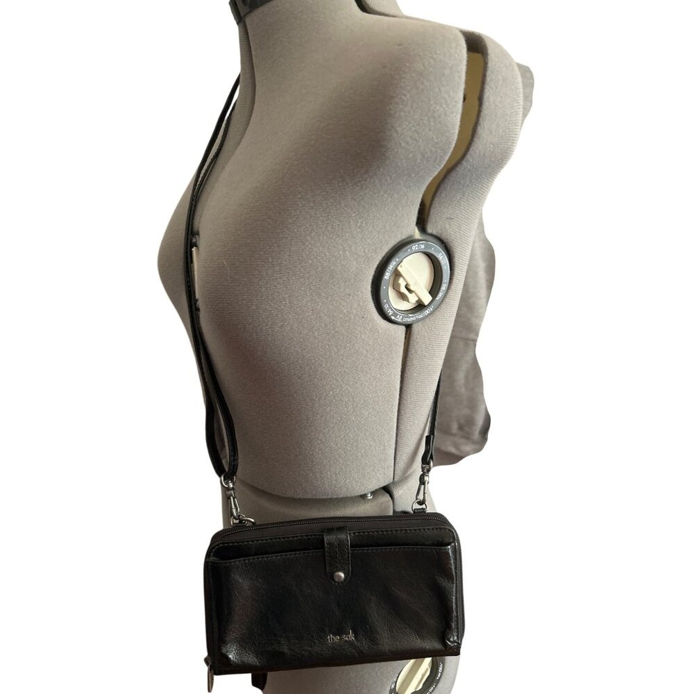 The Sak Black Leather Crossbody/Wristlet With Adjustable Strap & Zipper Closure